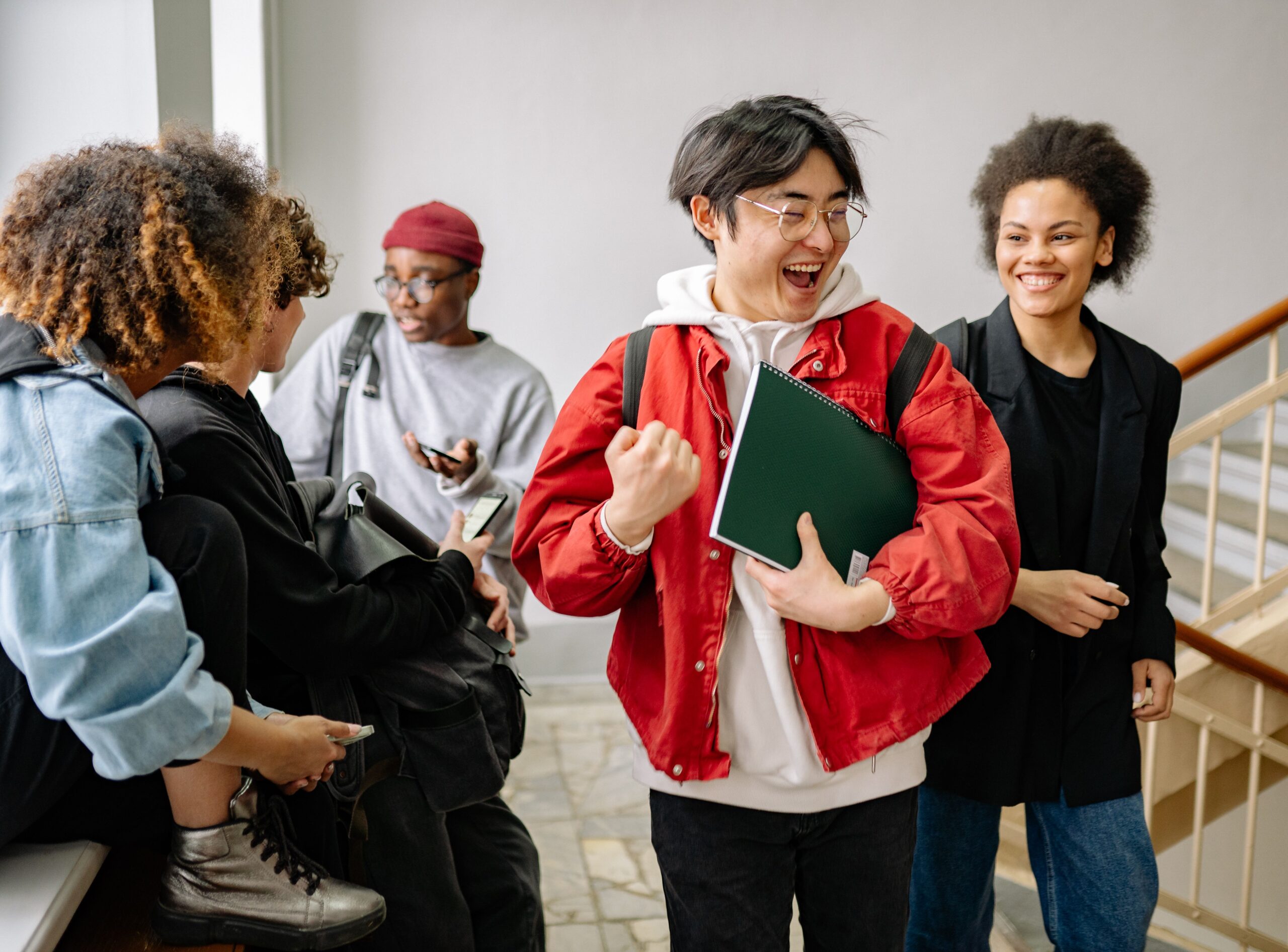 Photo by Yan Krukau: https://www.pexels.com/photo/group-of-students-talking-at-a-staircase-8199169/